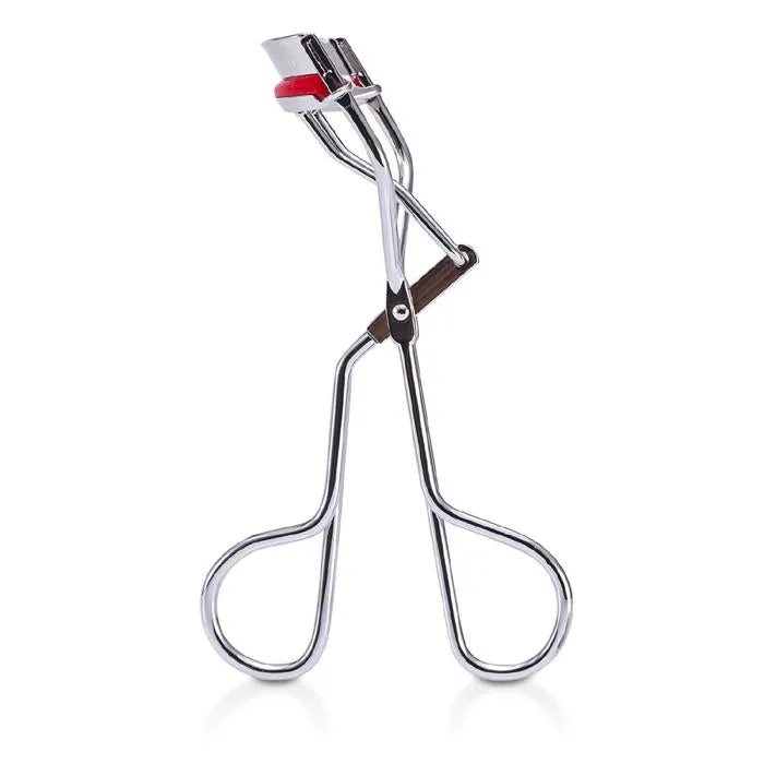 The Eyelash Curler - -
