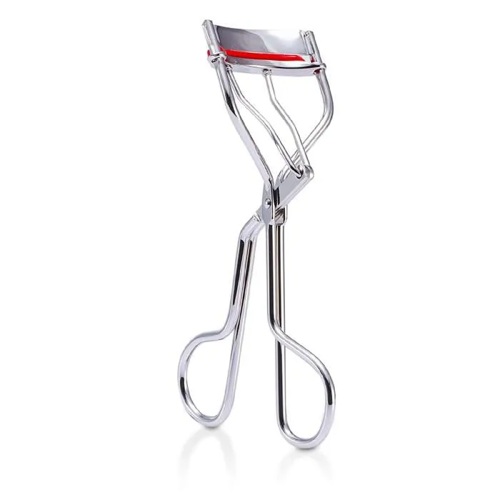 The Eyelash Curler - -